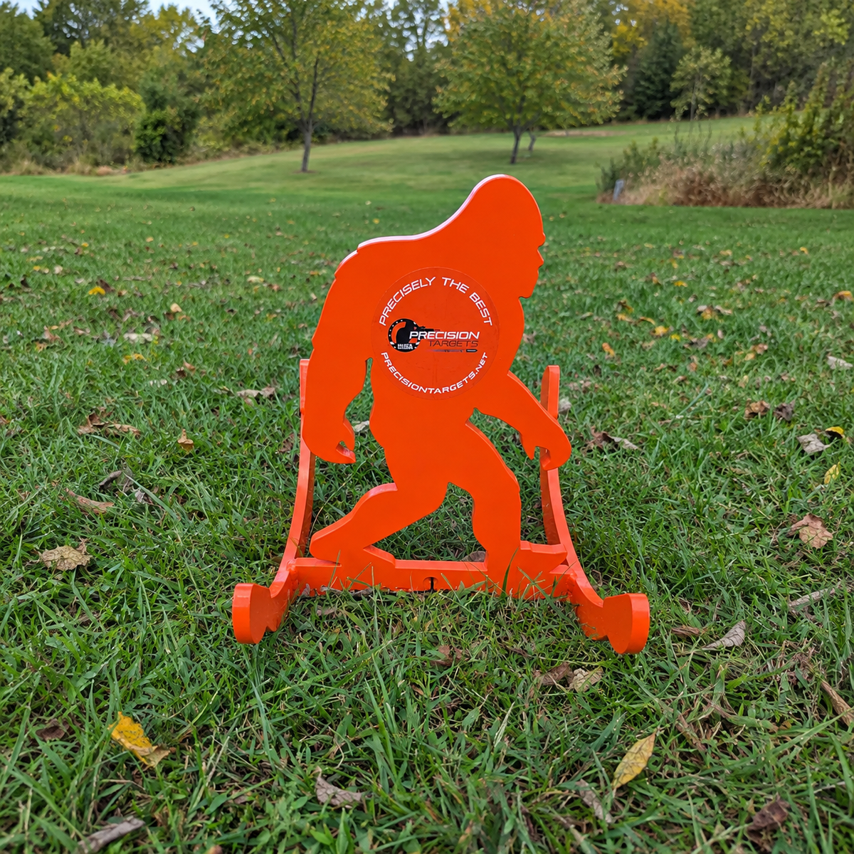 Rockin' Sasquatch AR500 self-resetting steel target fully visible on grass