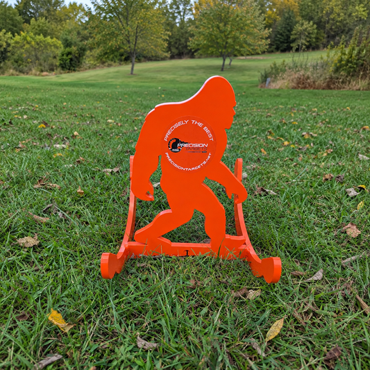 Rockin' Sasquatch AR500 self-resetting steel target fully visible on grass
